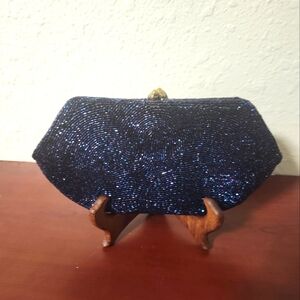 Dormar brand navy sequence evening bag 8"x4"